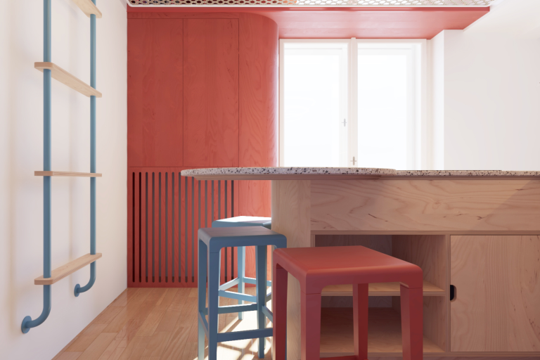 Interiér je kompletně laděný do kombinace bílé, červené, blankytně modré a odstínu přírodního dřeva